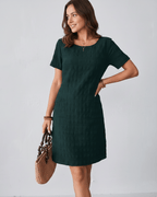 Avelin Mini Dress featuring textured fabric, round neckline, and short sleeves by Lauven, perfect for warm-weather styling.