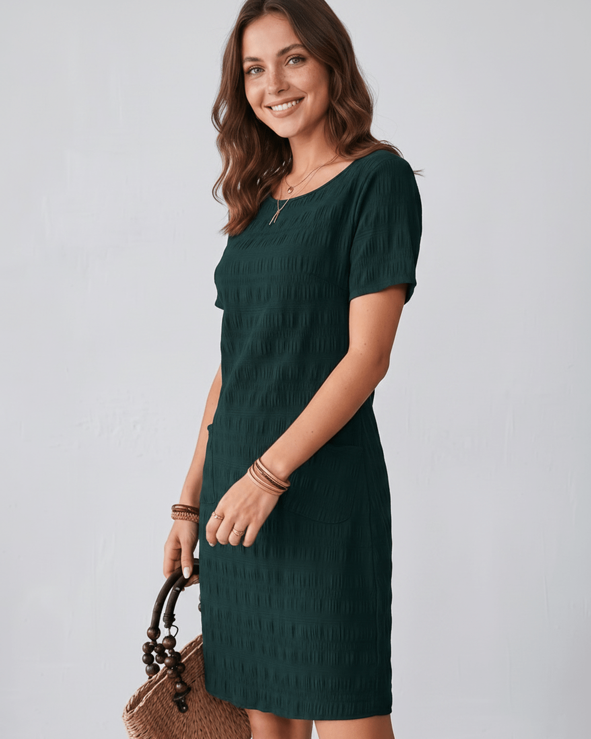 Avelin Mini Dress in textured fabric, round neckline, and short sleeves by Lauven, offering a modern, fresh style.