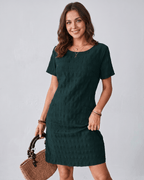 Avelin Mini Dress in textured fabric with round neckline, featuring short sleeves and a modern silhouette by Lauven.