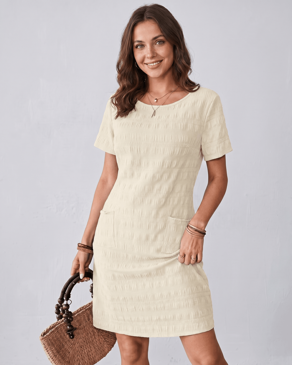 Avelin Mini Dress by Lauven, featuring textured fabric, round neckline, short sleeves, and a fresh look for warm weather.