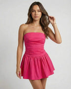 Azalea Mini Dress by Lauven - Vibrant pink strapless A-line silhouette perfect for summer events.
