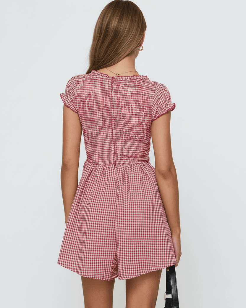 Azura Mini Dress from Lauven, showcasing a red checkered pattern and relaxed silhouette from the back.