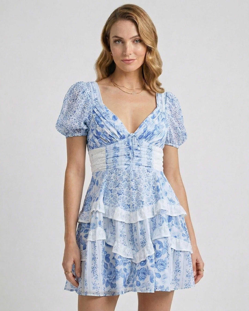 Azure Mini Dress by Lauven featuring blue floral print, tiered ruffles, and a flattering high waist design.