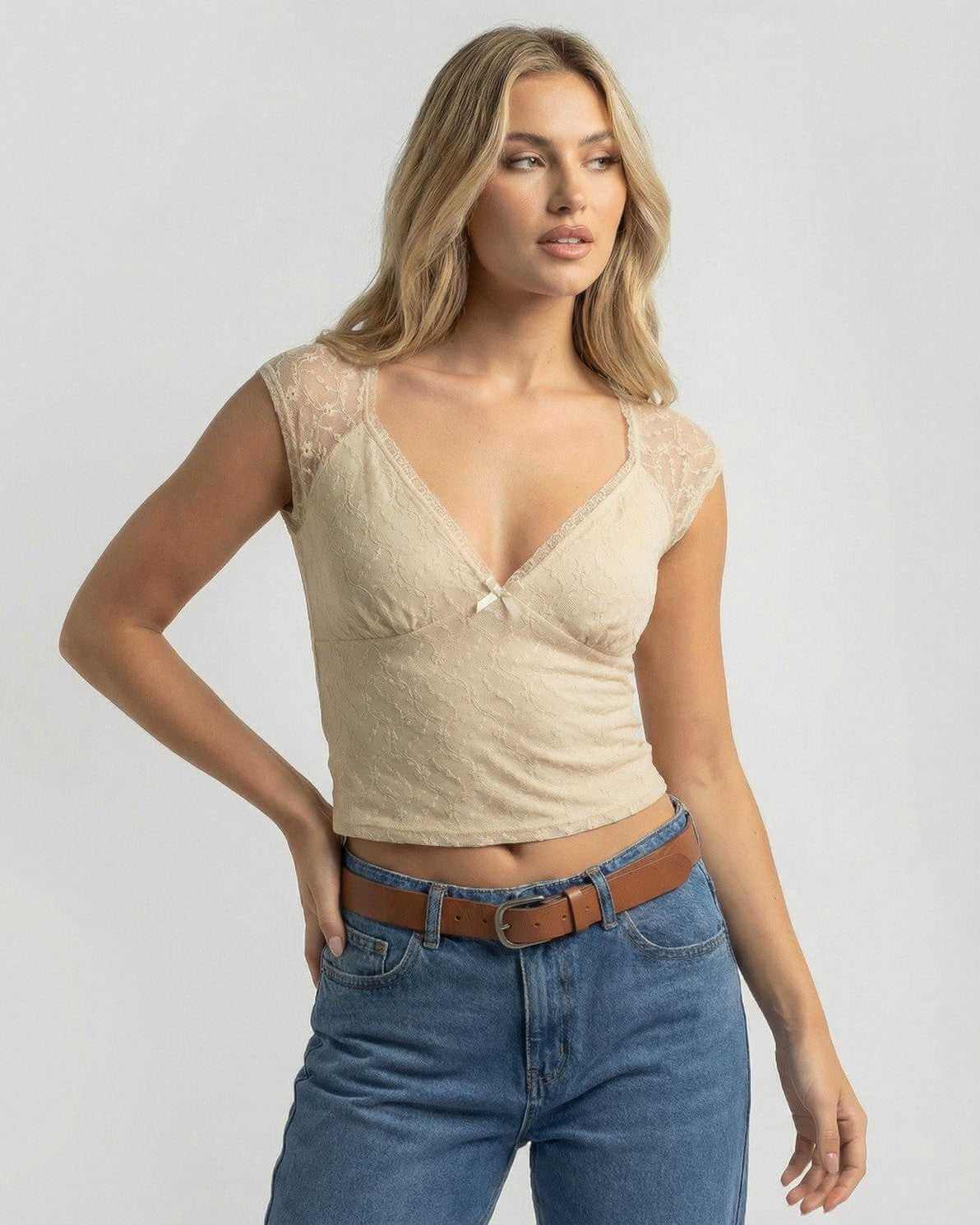 Beige Lace Top by Lauven, women’s slim fit crop tee with V-neck and lace detailing, perfect for summer styling.