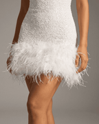 Bianca Mini Dress by Lauven featuring a white sequin bodycon design with a fuzzy hem.