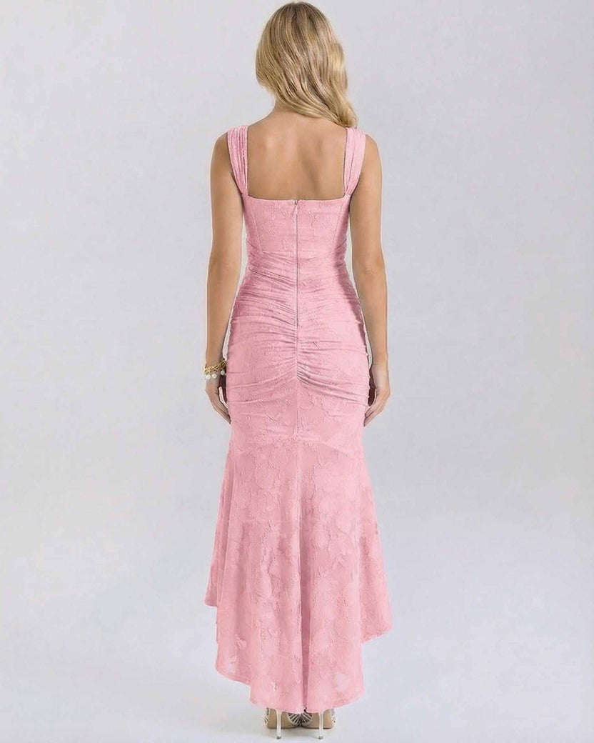 Blush Maxi Dress by Lauven, elegant back view showcasing soft pink jacquard fabric and fish tail hem.