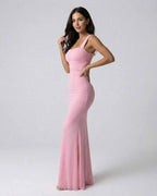 Blush Maxi Dress by Lauven featuring a sleek spaghetti strap silhouette in soft pink.