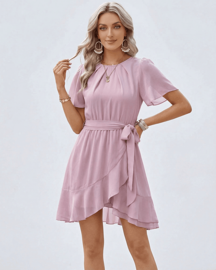 Blush Ruffle Dress by Lauven featuring flutter sleeves and waist tie for elegant styling.