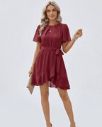 Burgundy Ruffle Dress by Lauven featuring flutter sleeves and adjustable waist tie for a flattering silhouette.