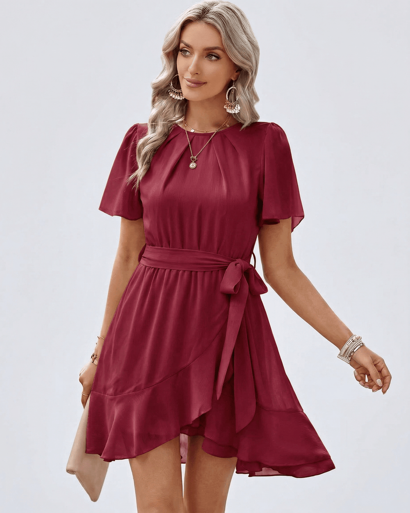 Burgundy Ruffle Dress by Lauven, featuring flutter sleeves and adjustable waist tie for a feminine silhouette.