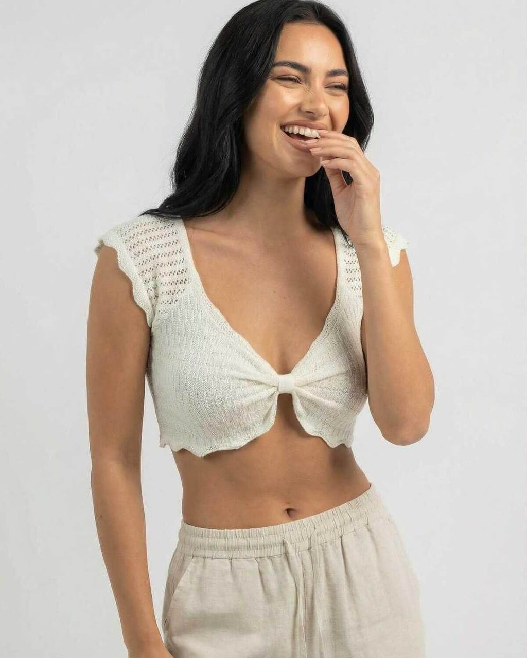 Calista Top by Lauven, a women’s cotton knit top with lettuce trim and V-neck style.
