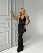 Calypso Maxi Dress - Black Knit Maxi Dress with Deep V-Neck and Ribbed Texture by Lauven for elegant day-to-night styling.