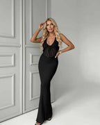 Calypso Maxi Dress - Black knit dress with deep V-neck, ribbed texture and sleek silhouette by Lauven.