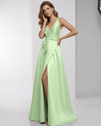 Calytrix Maxi Dress in mint green satin, featuring A-line silhouette, wrap slit, and bow detail by Lauven.