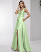 Calytrix Maxi Dress in mint green satin, featuring a wrap slit, bow detail, and elegant A-line silhouette by Lauven.