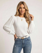 Celeste Blouse by Lauven - Elegant white pleated long sleeve top styled with denim.
