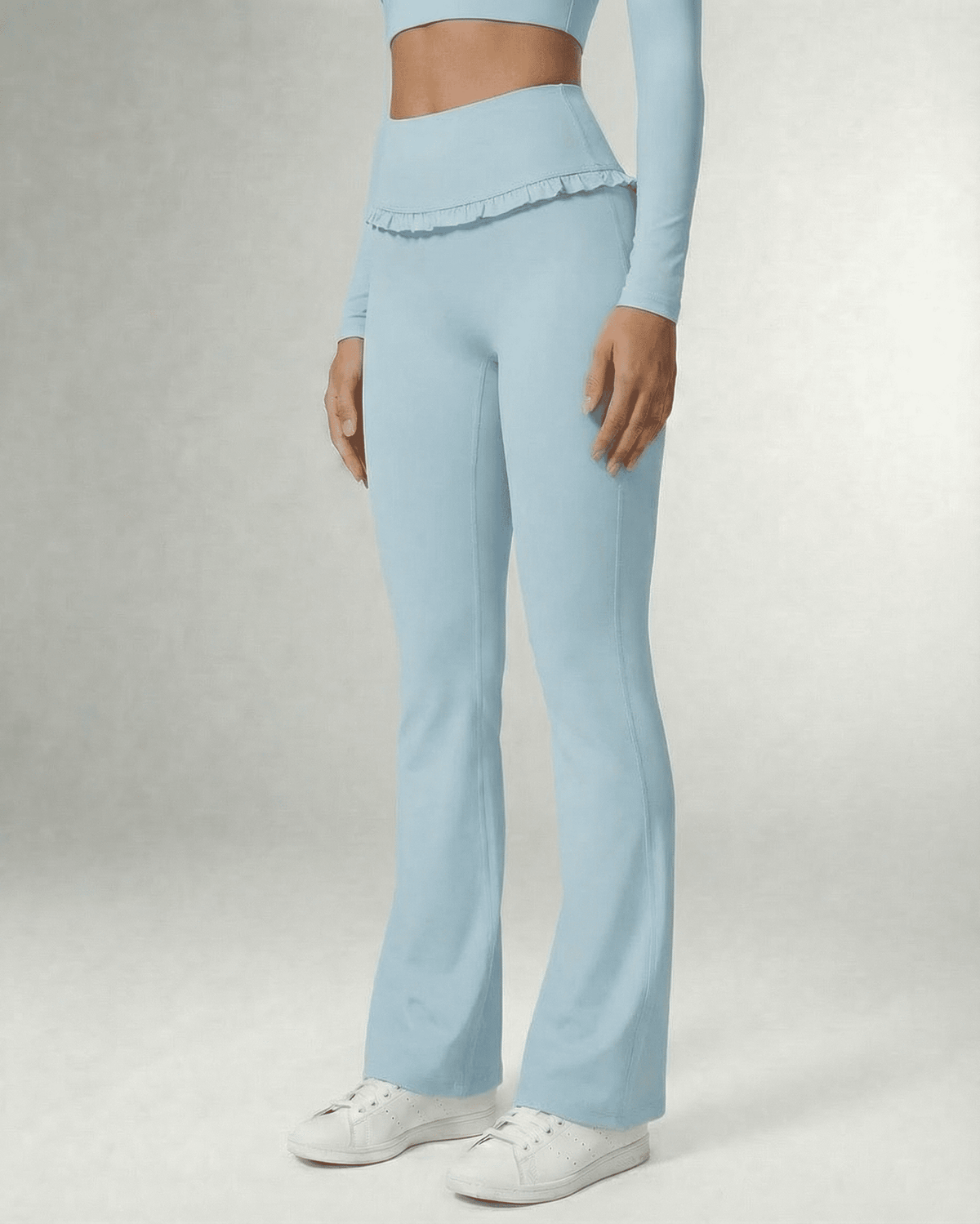 Celeste Leggings Blue by Lauven, stylish light blue flare pants with pockets, ideal for comfort and elegance.