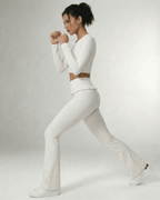 Celeste Leggings by Lauven, elegant white flare pants with pockets, high waist, and soft stretchy fabric.