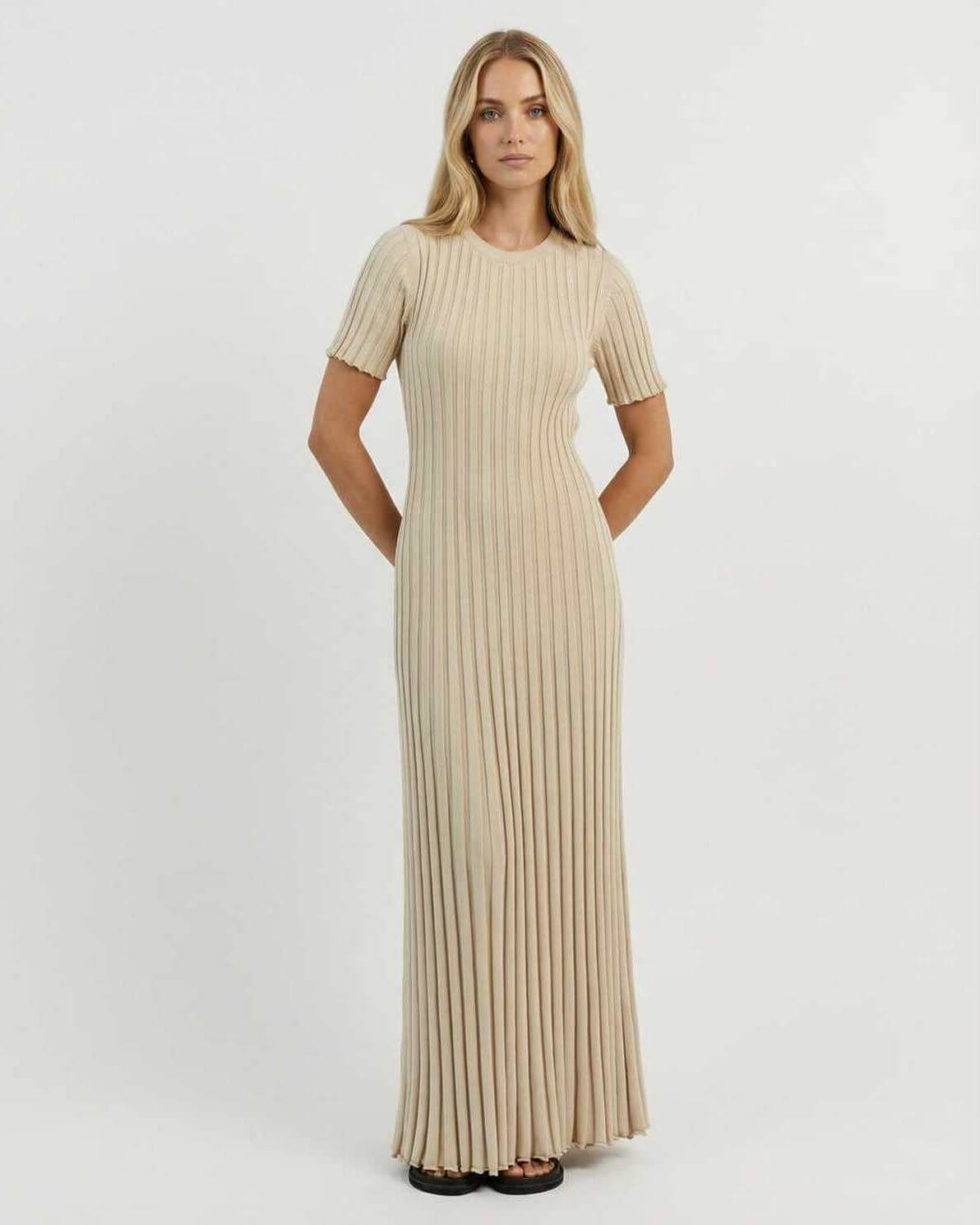 Celeste Maxi Dress by Lauven showcased in a refined ribbed knit fabric, featuring a comfortable ankle-length silhouette.