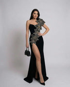 Celeste Maxi Dress by Lauven featuring a sleek black design and elegant floral embellishments.