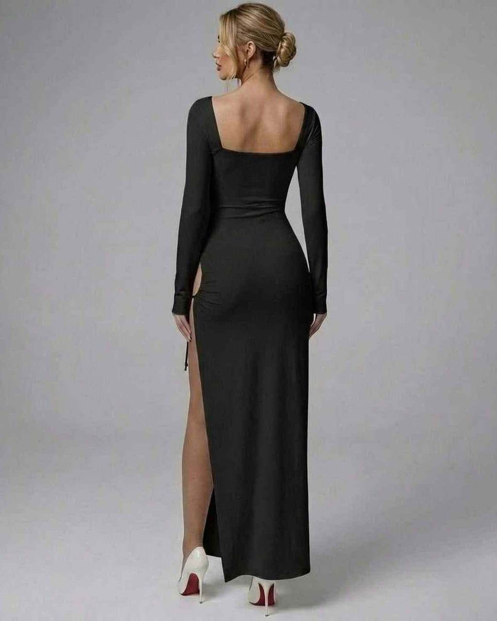 Celeste Maxi Dress by Lauven, elegant black long sleeve design with high slit, showcasing a fitted silhouette.