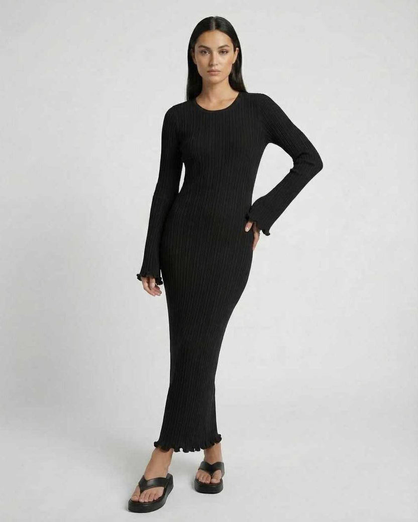 Lauven Celeste Maxi Dress in black, elegant ribbed knit with long flared sleeves and ruffle details.