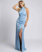 Celeste Maxi Dress in blue satin, featuring halter neck, high slit, and elegant drape by Lauven.