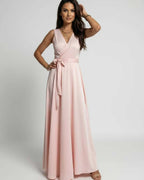 Celeste Maxi Dress by Lauven in blush pink featuring a soft, flowing fabric and timeless V-neck silhouette.