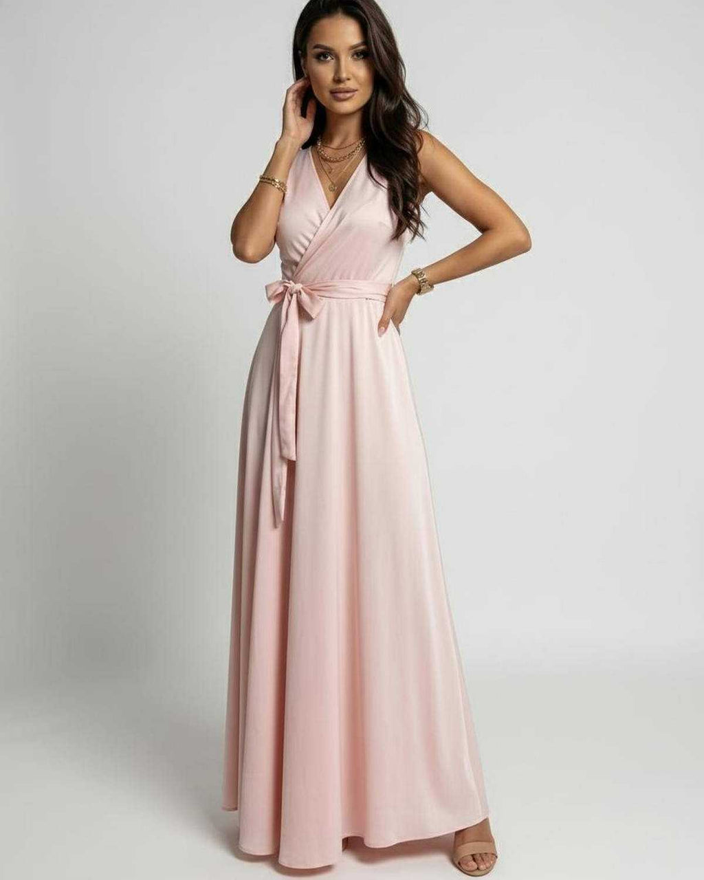 Celeste Maxi Dress by Lauven featuring a soft blush pink fabric, V-neck design, and elegant flowing silhouette.
