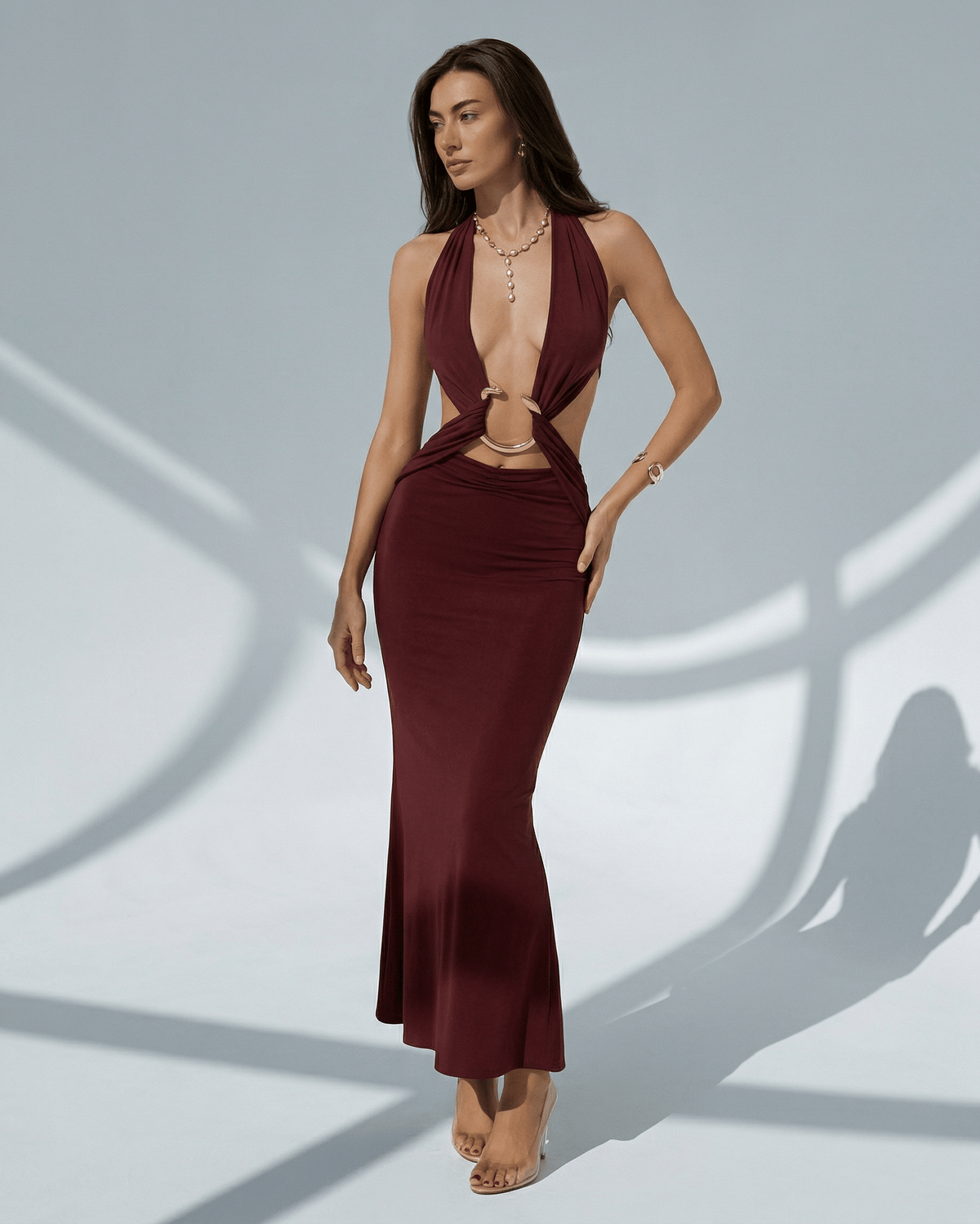 Celeste Maxi Dress in burgundy, elegant bodycon fit with deep V-neck, showcasing adjustable waist and luxe style by Lauven.