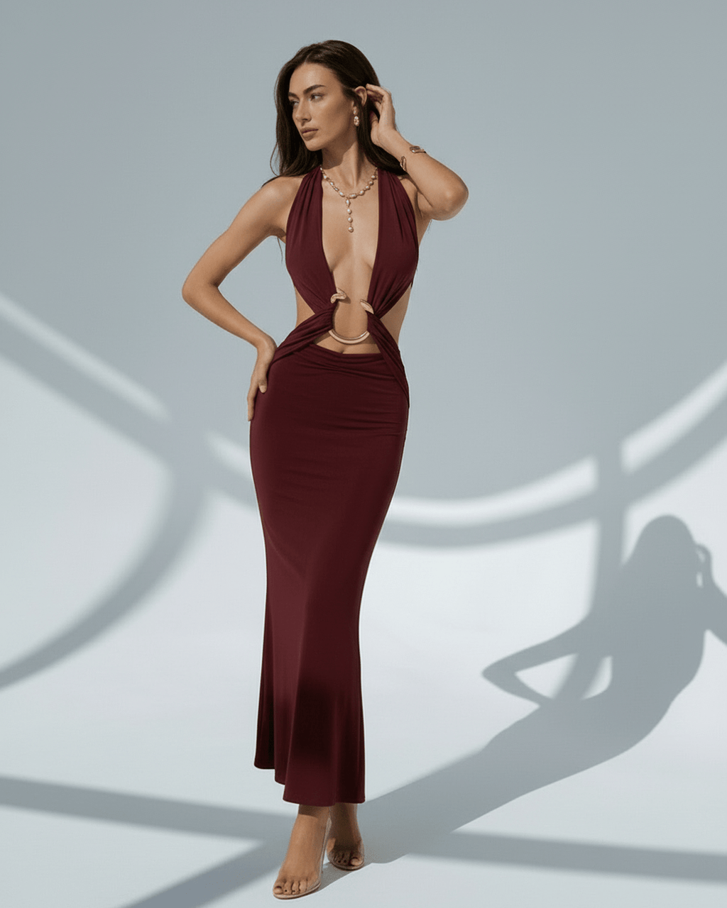 Celeste Maxi Dress in burgundy with deep V-neck, bodycon fit and adjustable waist by Lauven, perfect for sophisticated occasions.