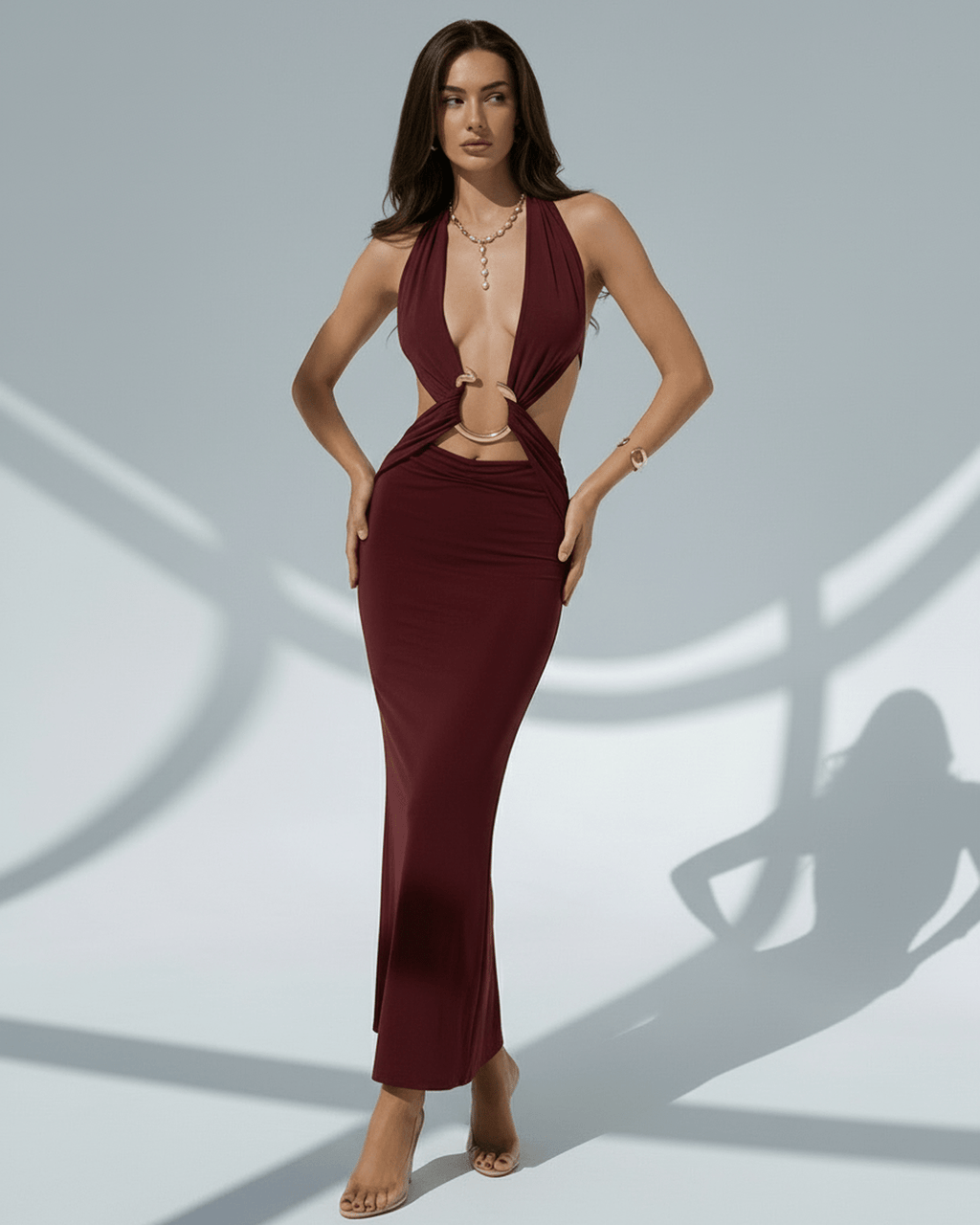 Celeste Maxi Dress featuring a bodycon fit, deep V-neckline, burgundy color, and designed by Lauven.