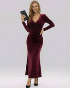 Celeste Maxi Dress by Lauven in luxurious burgundy velvet with long sleeves and a sleek silhouette.
