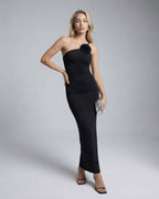 Celeste Maxi Dress by Lauven, elegant asymmetrical black evening gown with a sleek silhouette and appliques.