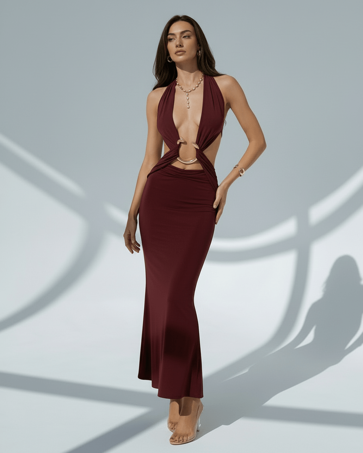 Celeste Maxi Dress featuring elegant burgundy bodycon silhouette with deep V-neck, crafted by Lauven for a sophisticated look.