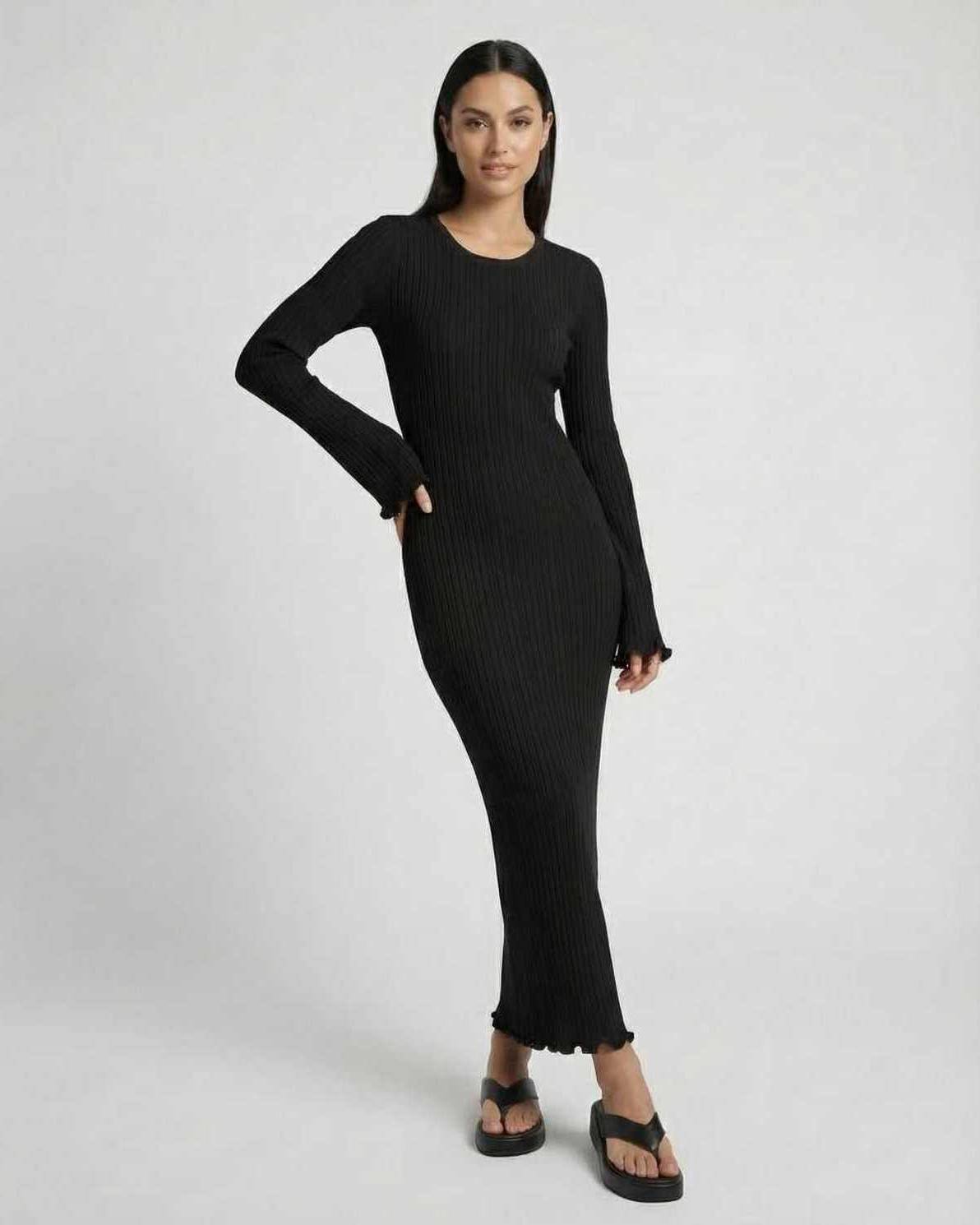 Celeste Maxi Dress by Lauven, elegant ribbed knit midi dress with ruffle details and long flared sleeves in black.
