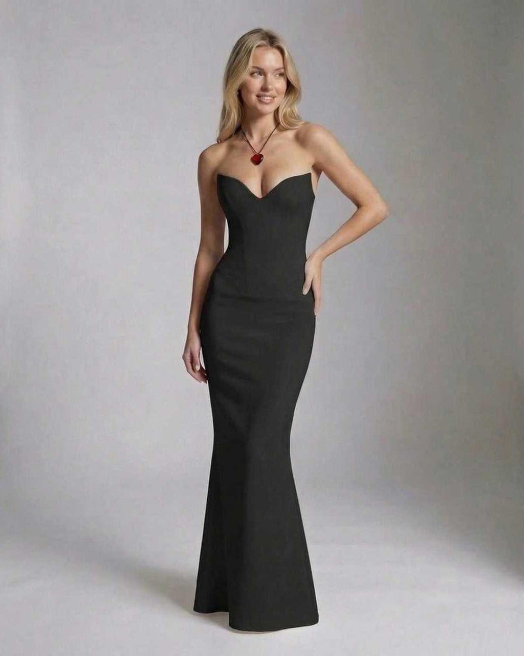 Celeste Maxi Dress by Lauven, elegant black textured knit ankle-length dress with flattering silhouette.