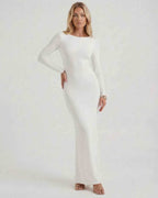 Lauven Celeste Maxi Dress, elegant white long sleeve design, open back, smooth fabric for formal occasions.