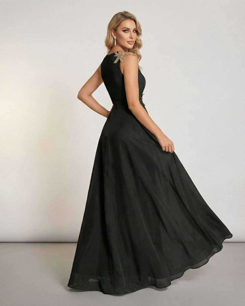 Celeste Maxi Dress by Lauven, sleeveless black maxi dress with elegant patchwork detail and flowing silhouette.