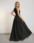 Celeste Maxi Dress by Lauven, sleeveless black maxi dress with elegant patchwork detail and flowing silhouette.