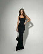 Celeste Maxi Dress by Lauven, sleek black stretch satin dress with subtle sparkles and a modern camisole design.