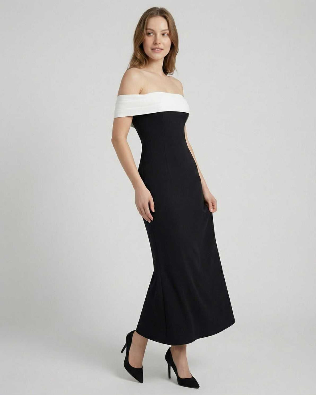 Celeste Maxi Dress by Lauven featuring an elegant off-shoulder silhouette in black and white, perfect for sophisticated occasions.