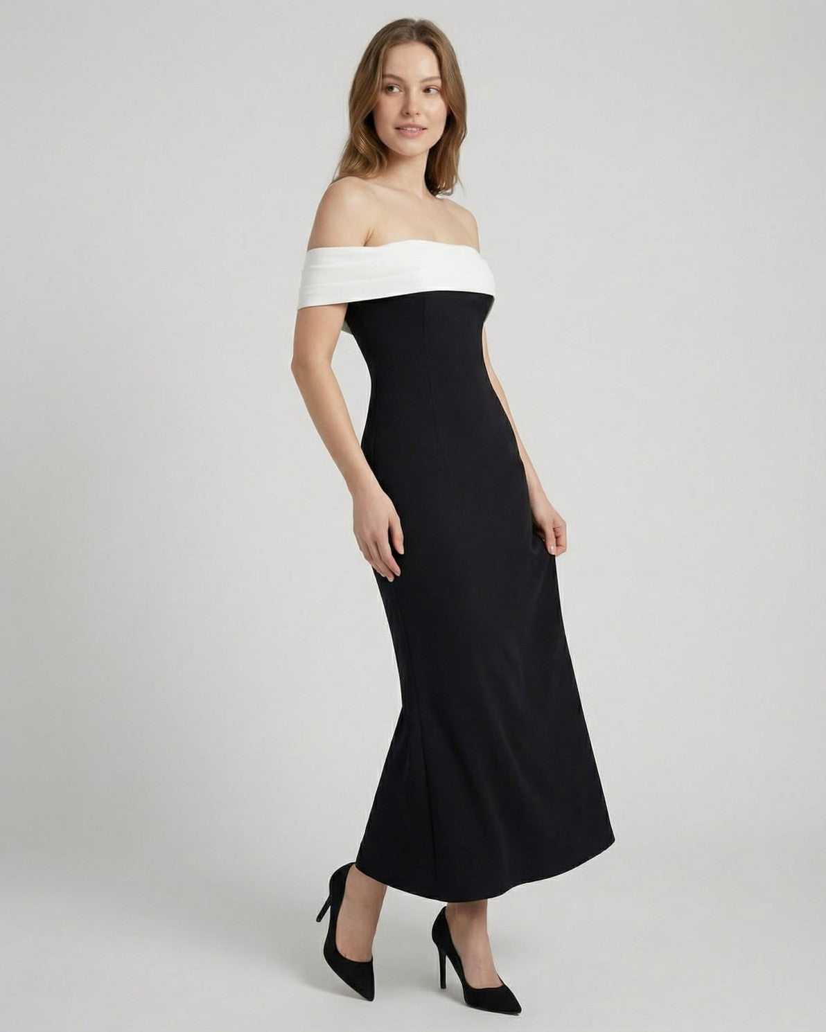 Celeste Maxi Dress by Lauven featuring an elegant off-shoulder silhouette in black and white, perfect for sophisticated occasions.