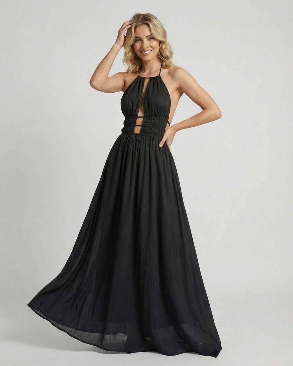 Celeste Maxi Dress by Lauven featuring an elegant halter neck and sleek black silhouette, perfect for any occasion.