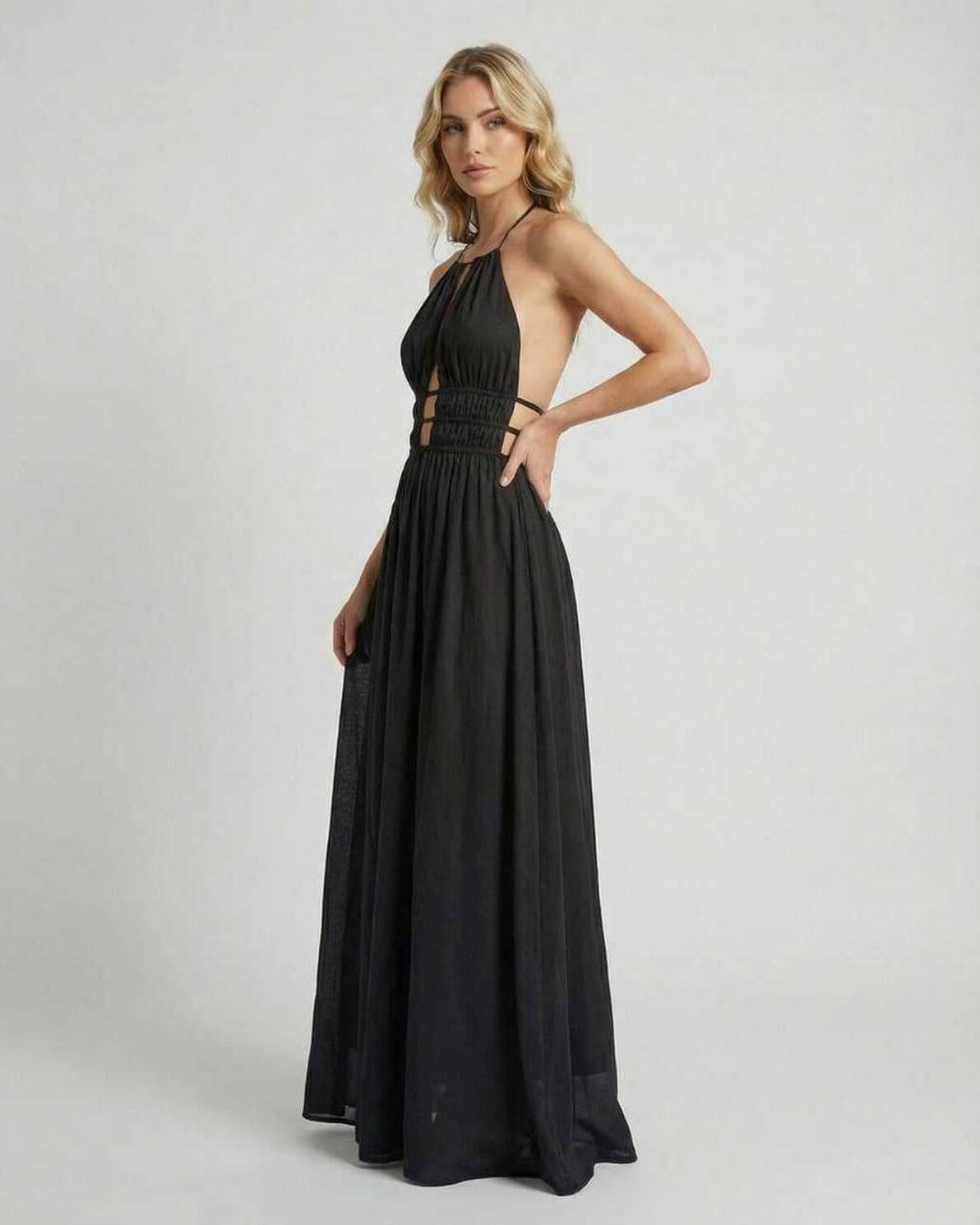 Celeste Maxi Dress by Lauven featuring an elegant halter neck and sleek black silhouette for a flattering fit.