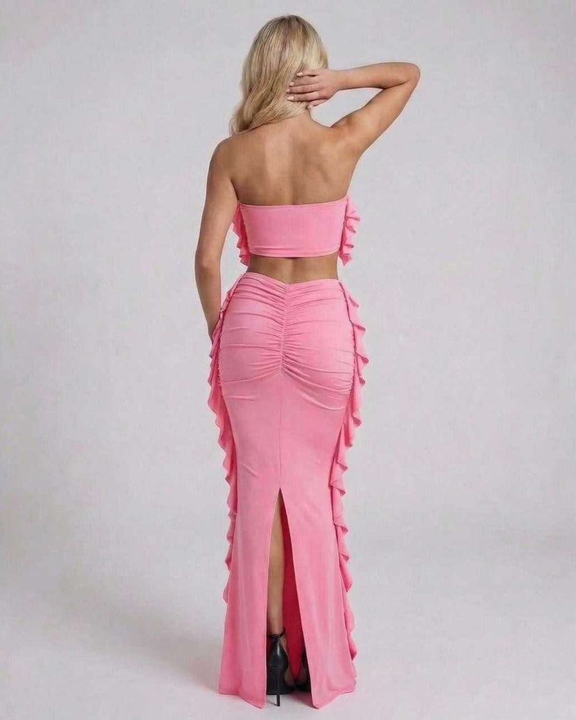 Celeste Maxi Dress - Elegant pink maxi dress with ruffle accents by Lauven, showcasing a modern strapless design.