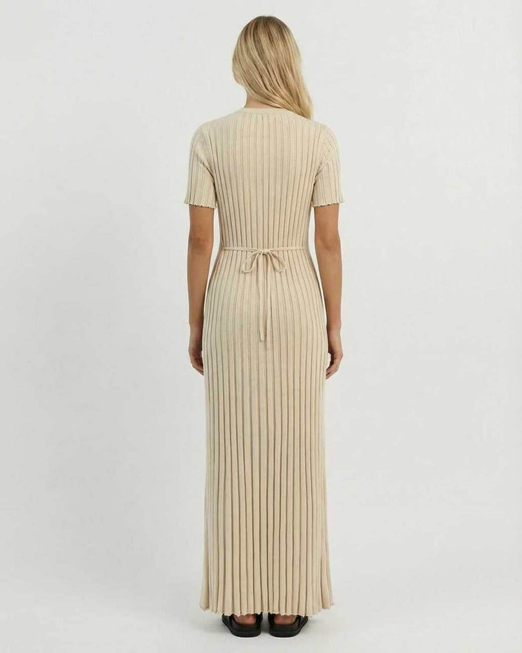 Back view of the Celeste Maxi Dress by Lauven, featuring a ribbed knit design and ankle-length silhouette.