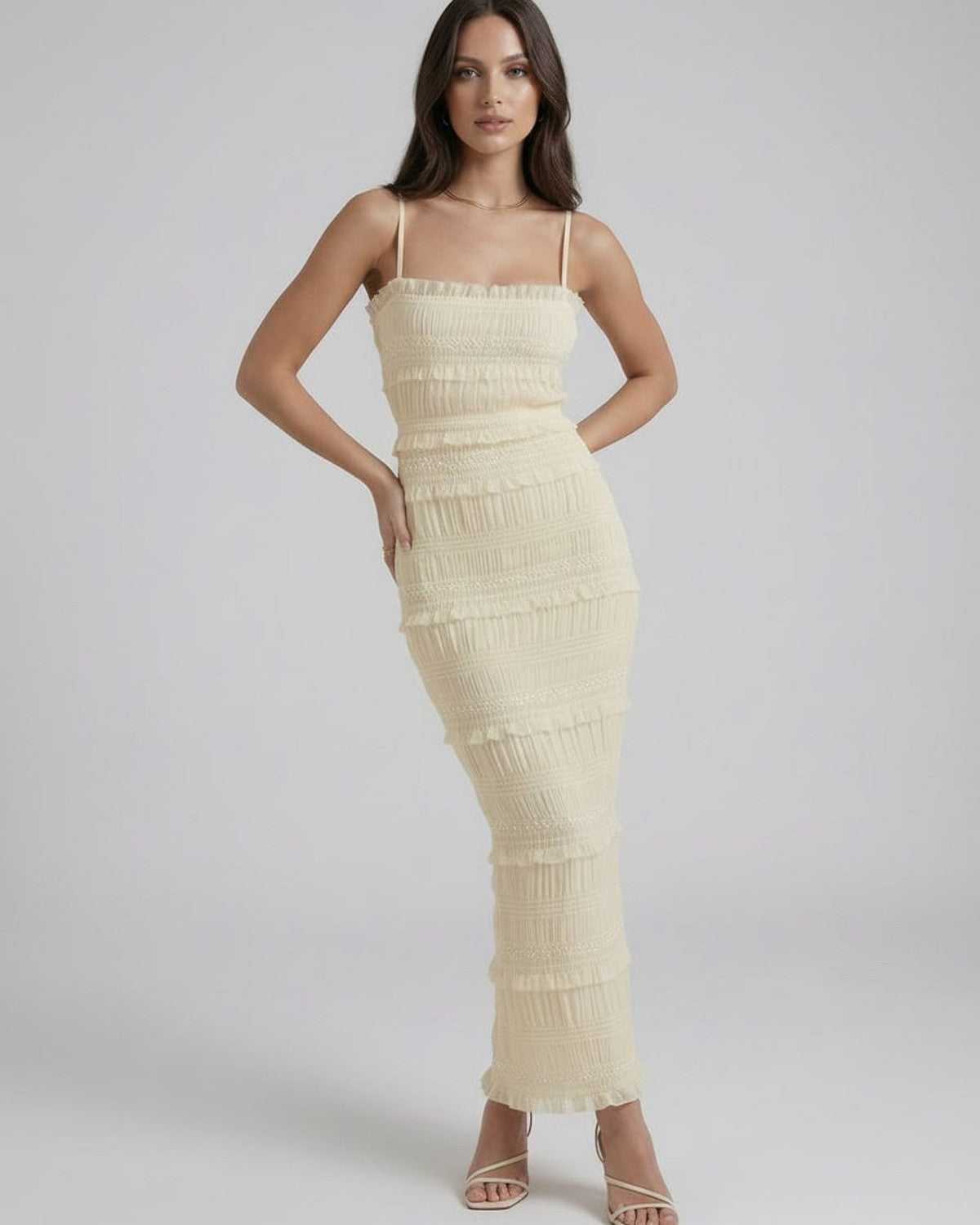 Celeste Maxi Dress by Lauven featuring a sleek sheath silhouette and spaghetti straps in soft ivory.