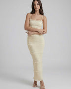 Lauven Celeste Maxi Dress in soft ivory with spaghetti straps, elegant sheath silhouette for luxury evening wear.