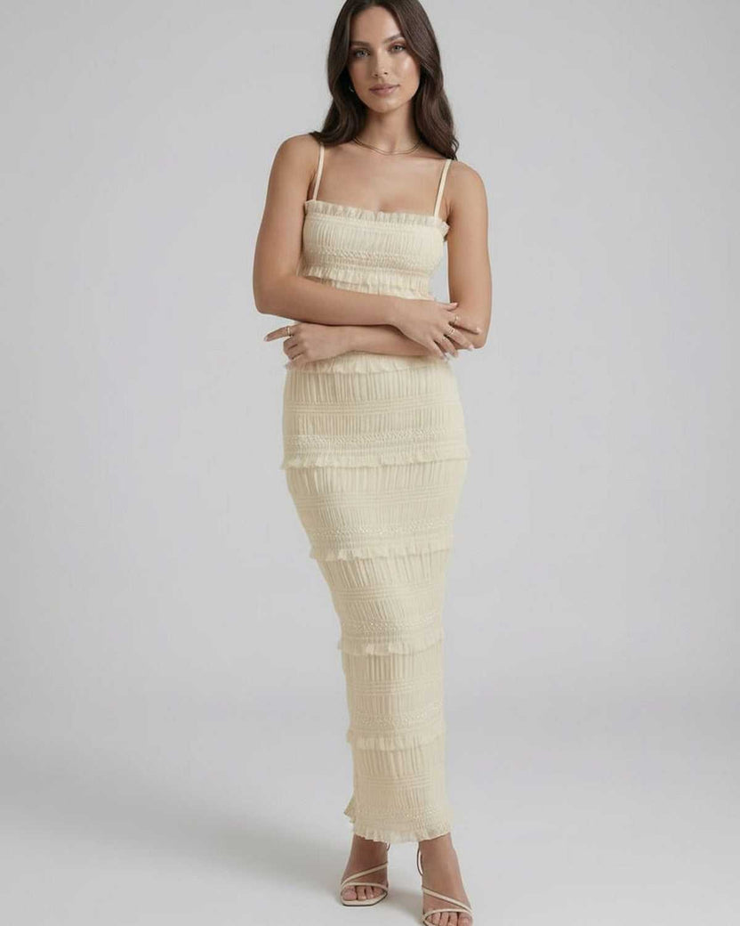 Lauven Celeste Maxi Dress in soft ivory with spaghetti straps, elegant sheath silhouette for luxury evening wear.